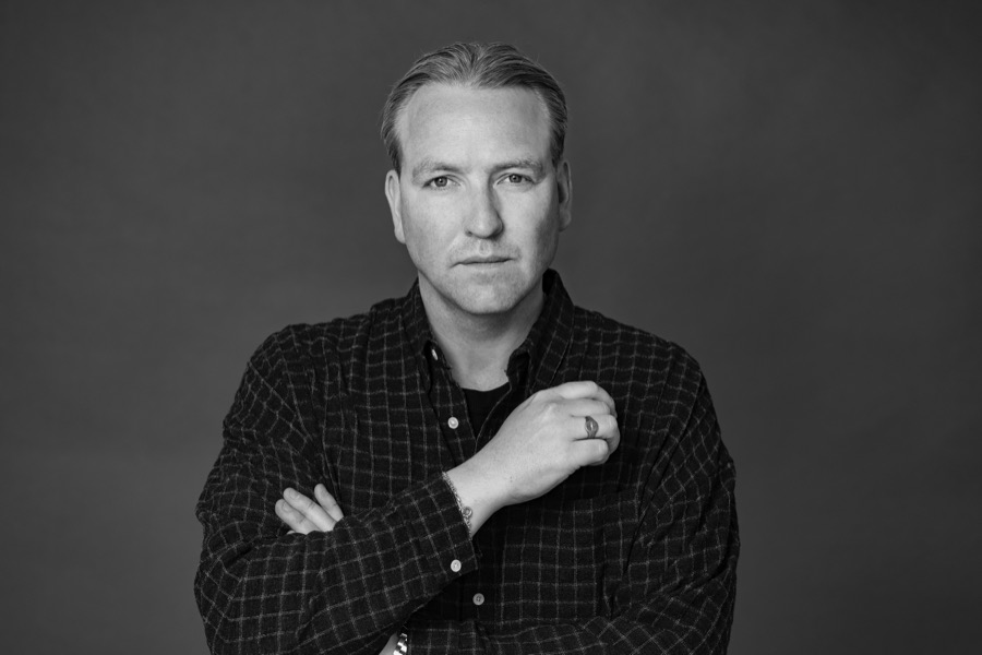 Sindri Jensson í köflóttri skyrtu